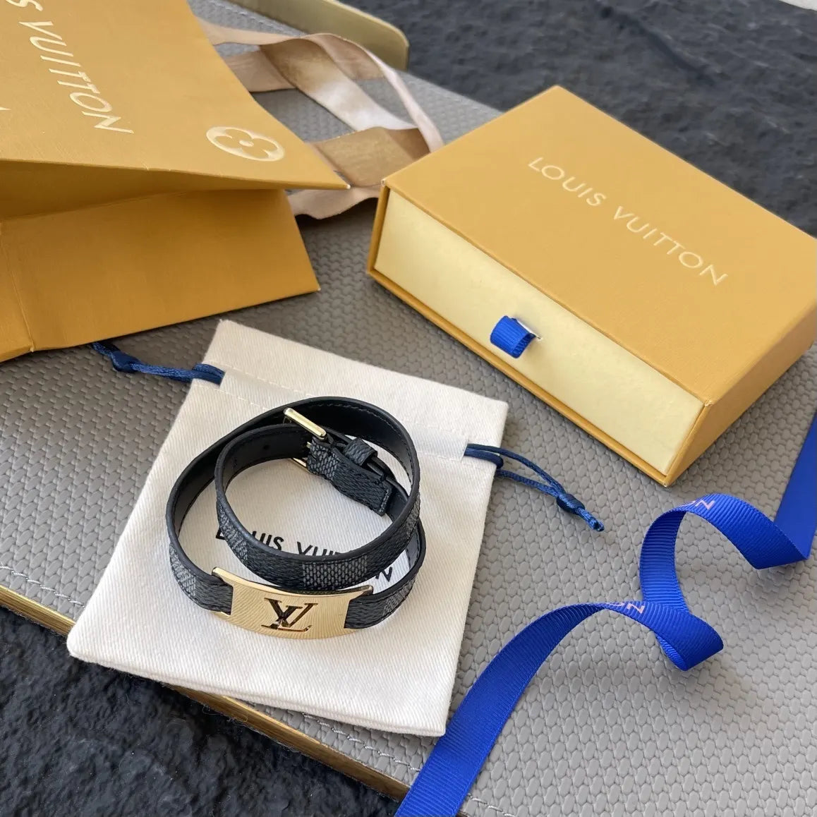 Luxury LV Damier Ebene Leather Bracelet on wrist - Hình 2